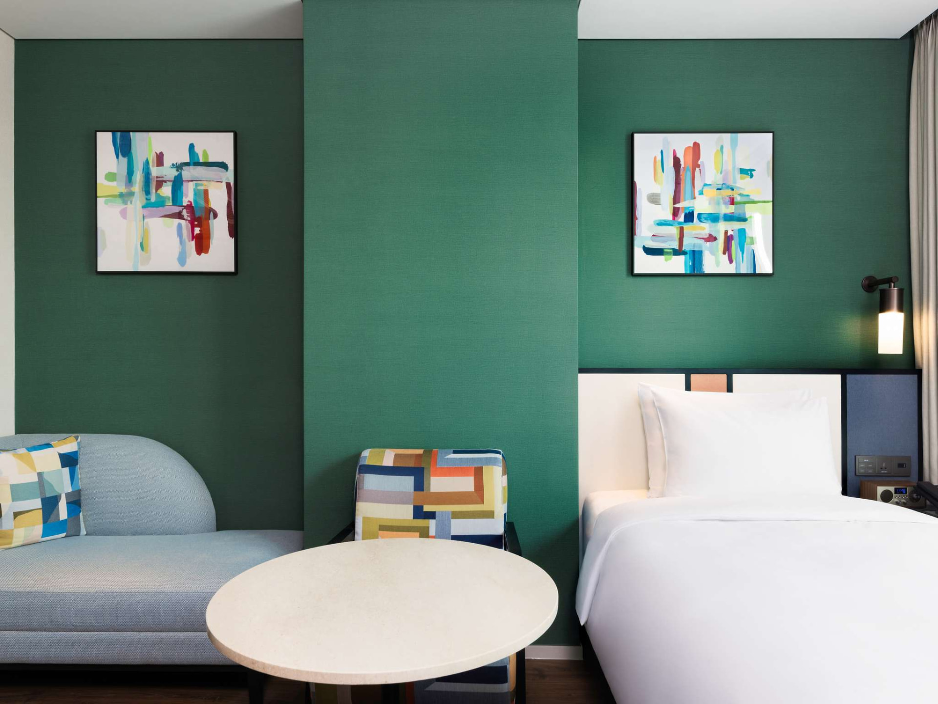 Single bed room with seating area