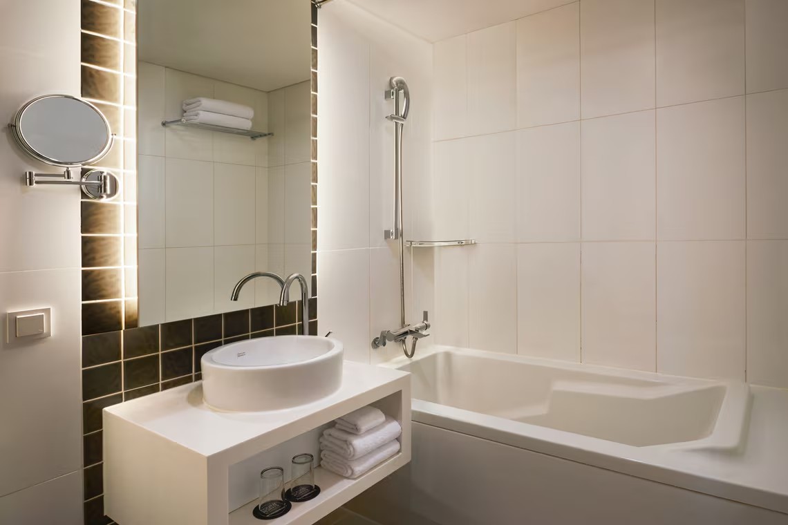 Guest bathroom with bathtub